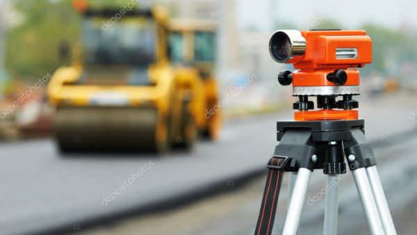 depositphotos_5745337-stock-photo-survey-equipment-at-asphalting-works